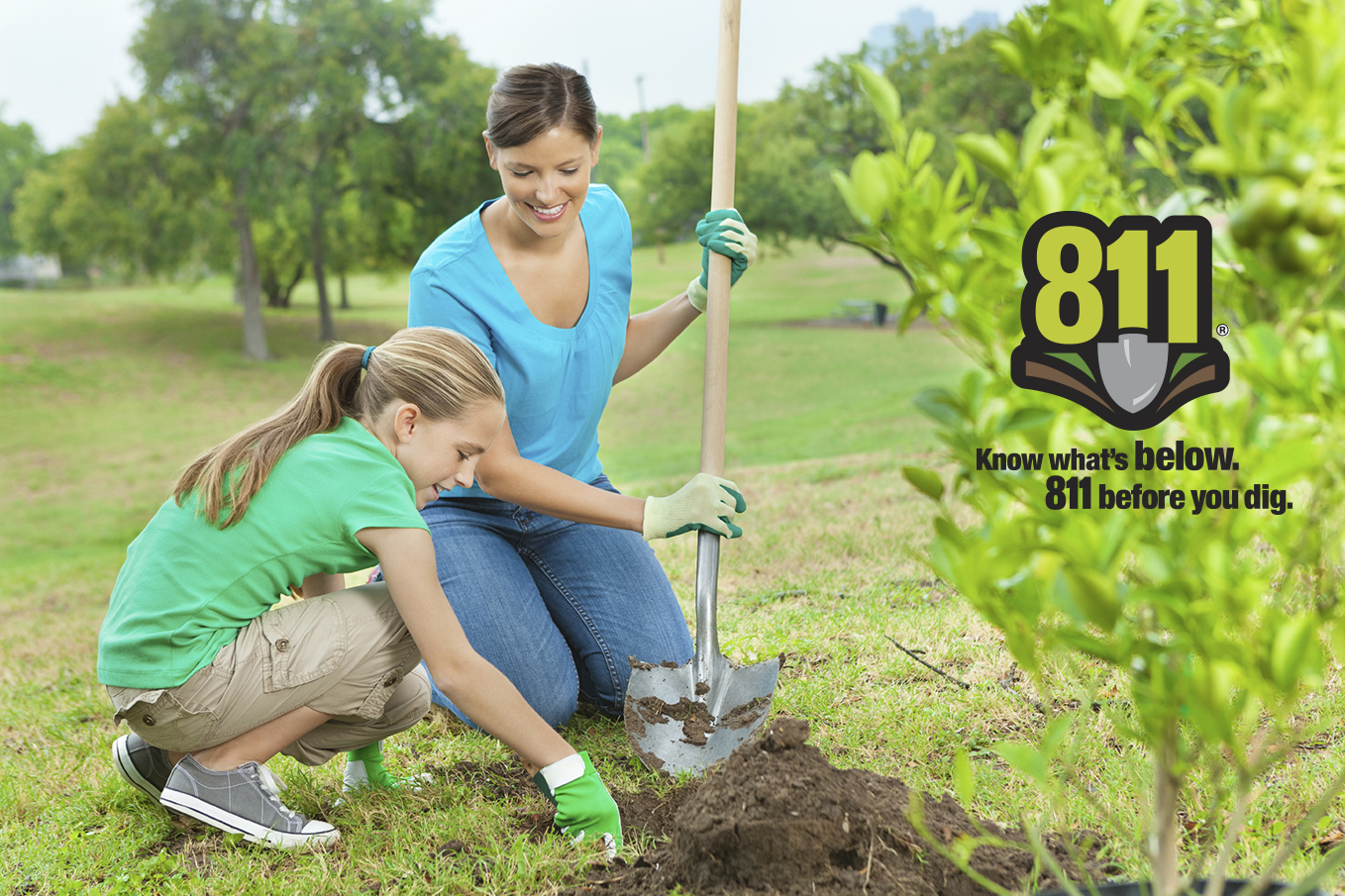 Woman and girl digging
